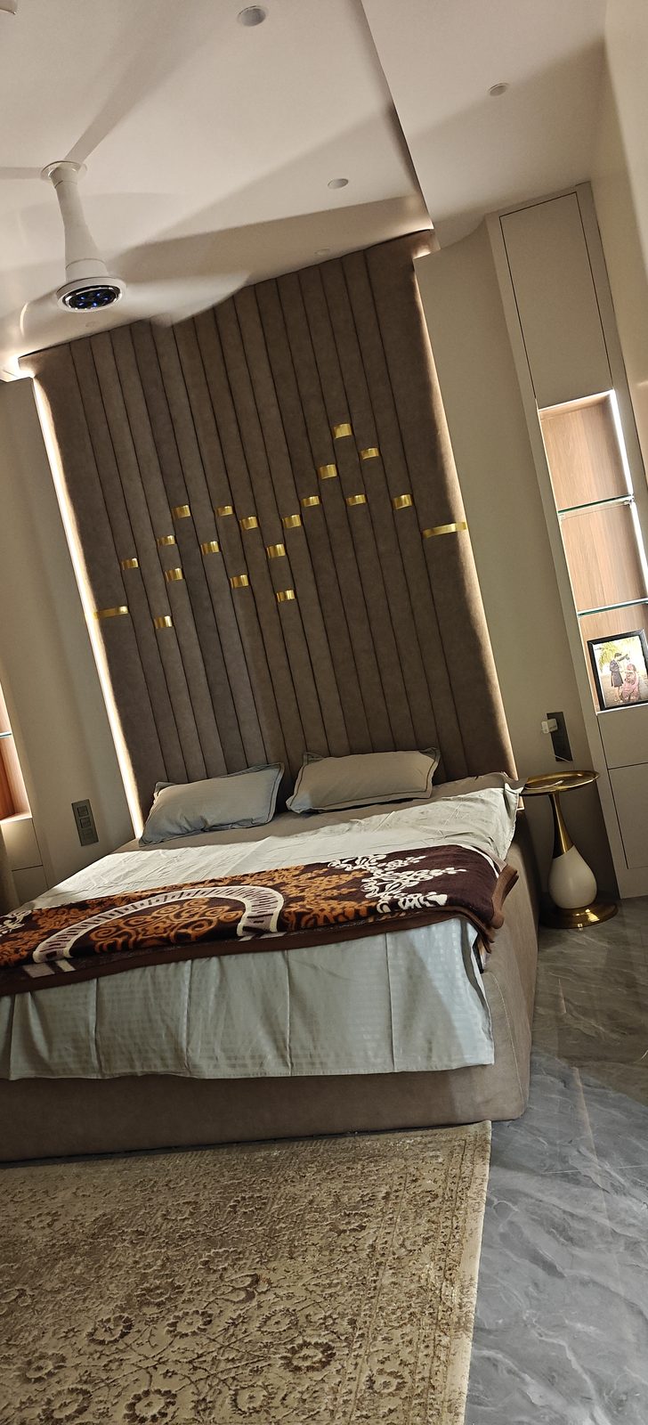 Bedroom with fluted headboard wall, false ceiling and concealed cove lighting, Udgir