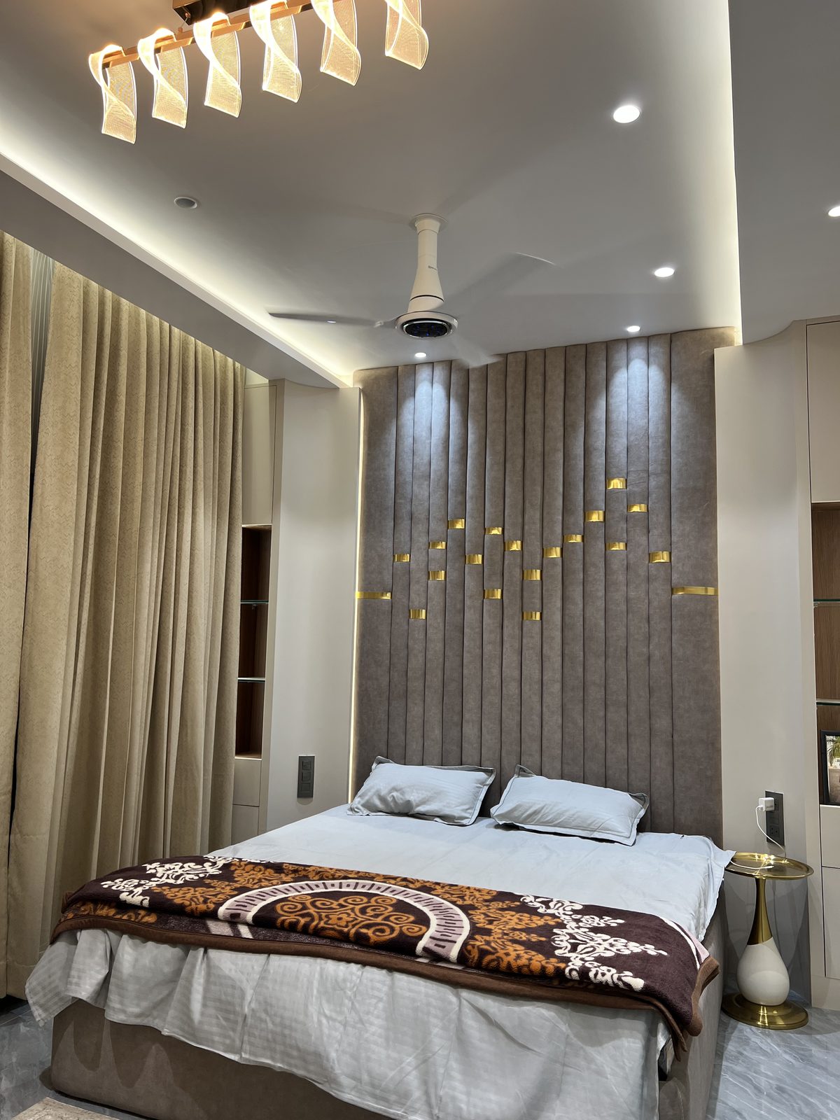 Custom designer bed with full height padded headboard panel and recessed lighting, Latur